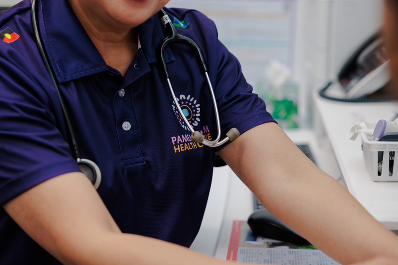An image of Pamela Mam Health Centre worker with a stethoscope on their neck, for MyMedicare